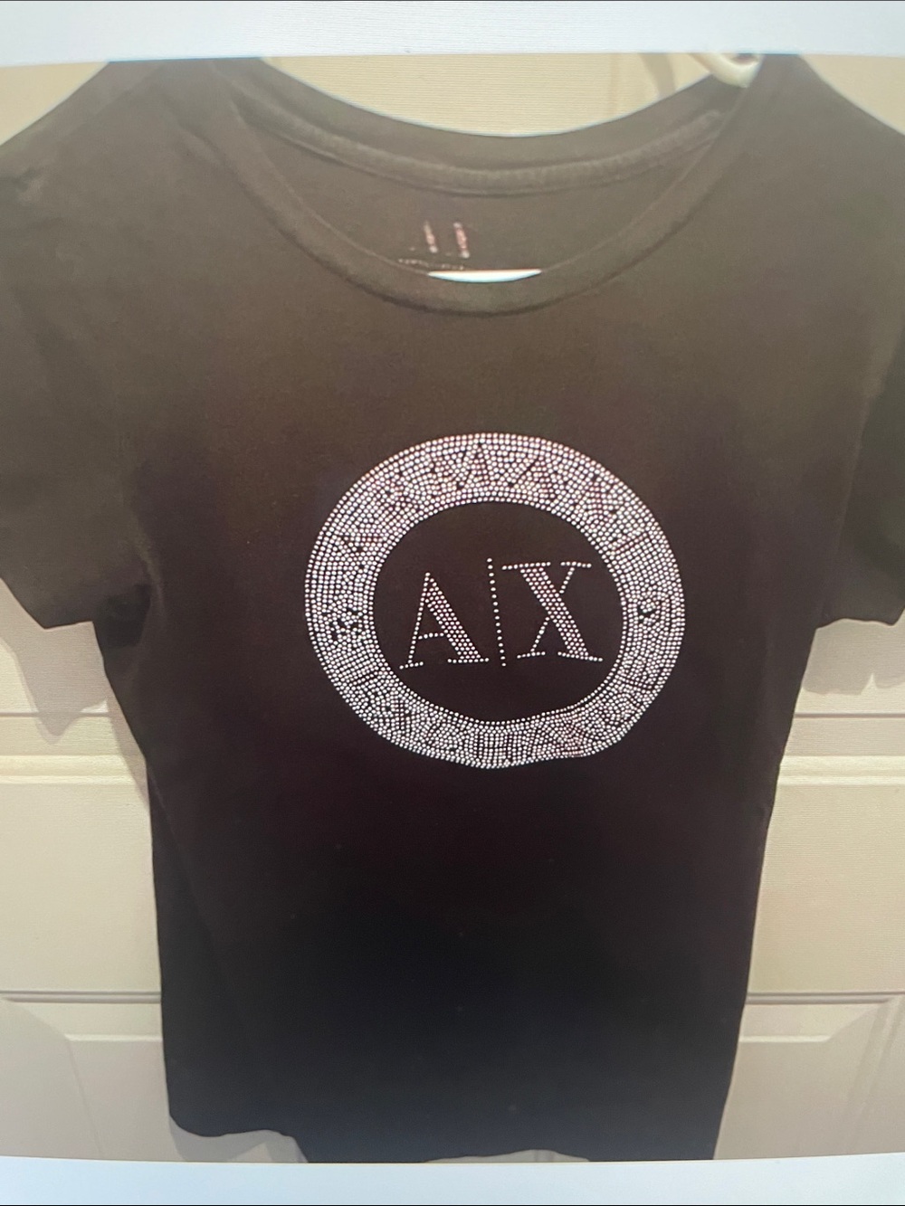 Armani Exchange Black Tee with seed pearls.AX Circle